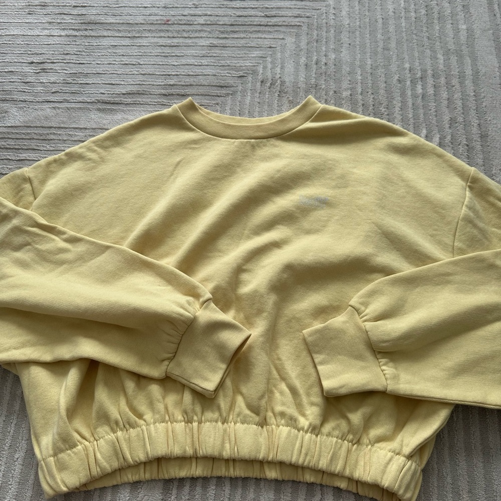Levi’s Yellow Sweater